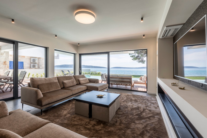 Living room and kitchen, Villa Sea Star with an infinity pool by the sea, in Ka&scaron;tel Kambelovac - Split, Croatia Ka&scaron;tel Kambelovac