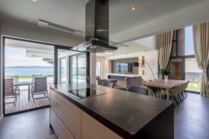 Living room and kitchen, Villa Sea Star with an infinity pool by the sea, in Ka&scaron;tel Kambelovac - Split, Croatia Ka&scaron;tel Kambelovac