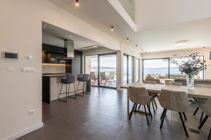 Living room and kitchen, Villa Sea Star with an infinity pool by the sea, in Ka&scaron;tel Kambelovac - Split, Croatia Ka&scaron;tel Kambelovac