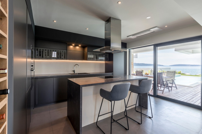 Living room and kitchen, Villa Sea Star with an infinity pool by the sea, in Ka&scaron;tel Kambelovac - Split, Croatia Ka&scaron;tel Kambelovac